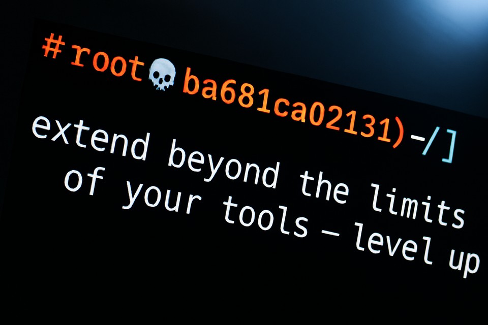Terminal showing “extend beyond the limits of your tools — level up” in green text on black screen, representing coding empowerment for security professionals